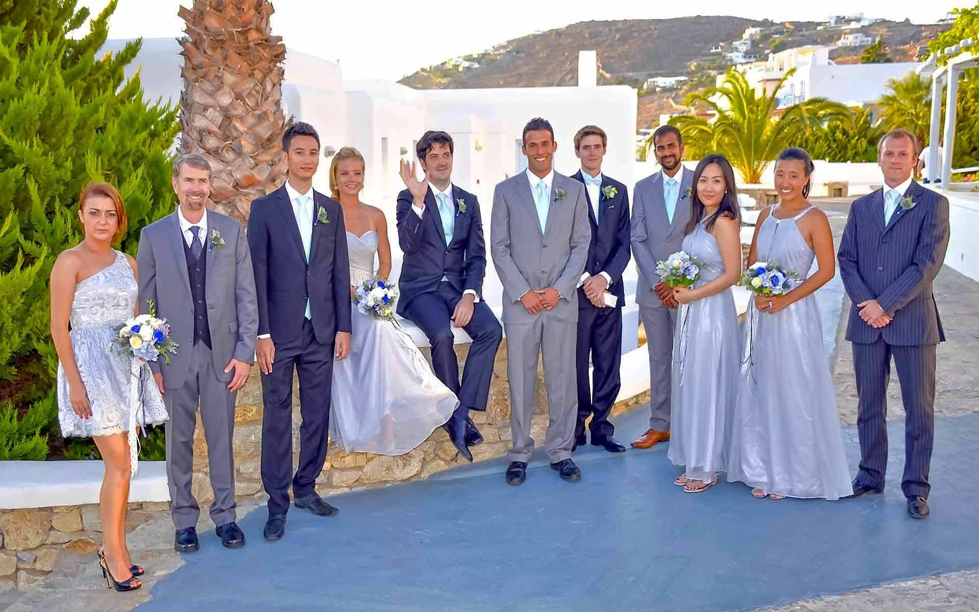 Bridesmaids-Groomsmen-Are-Waiting-For-The-Bride-To-Walk-Down-The-Aisle-In-Mykonos-Wedding