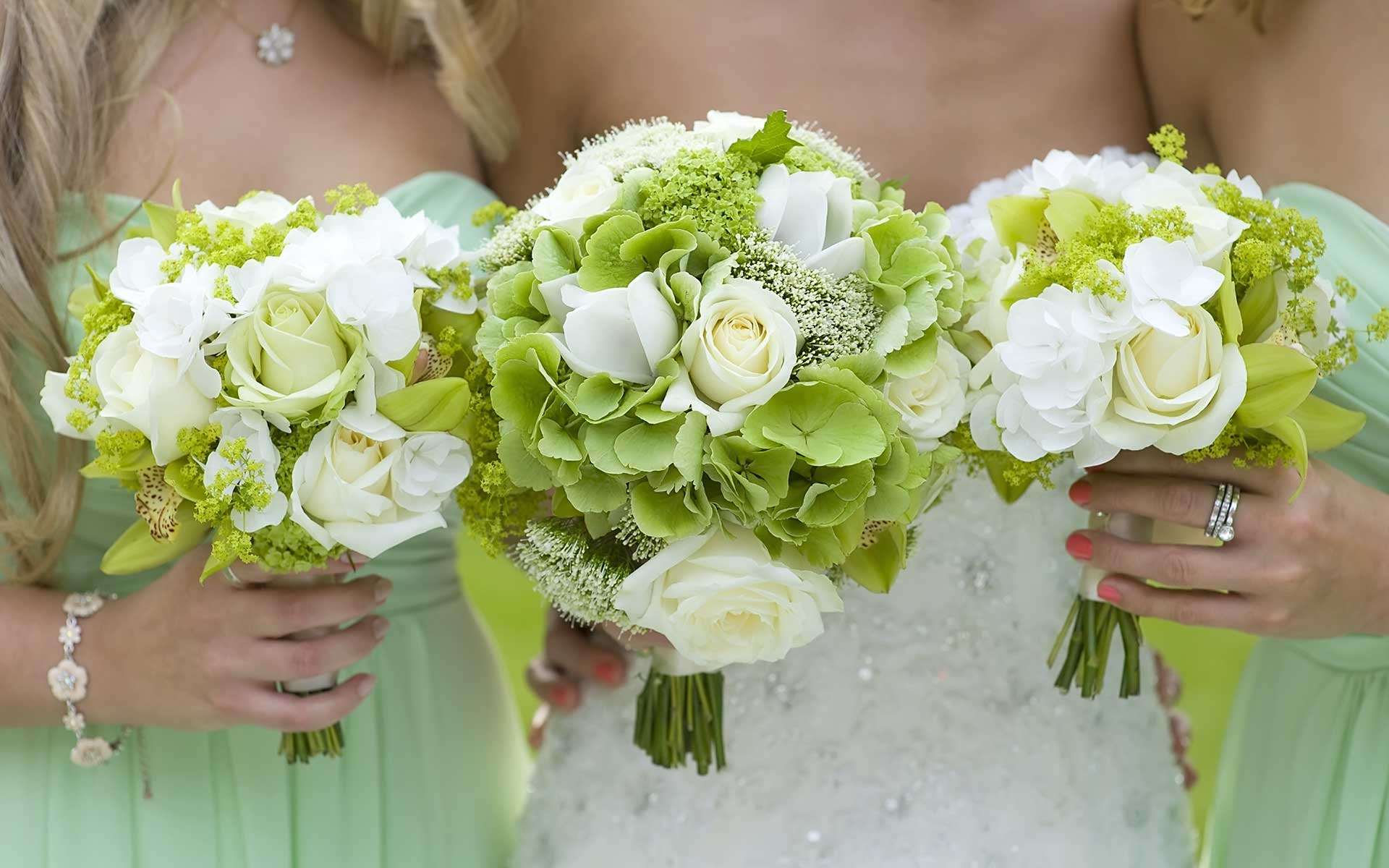White-Roses-Seamlessly-Peak-Through-Green-Hydrangeas-A-Pinch-Of-Baby’s-Breath-Adds-Texture-To-These-Bridal-Bouquets