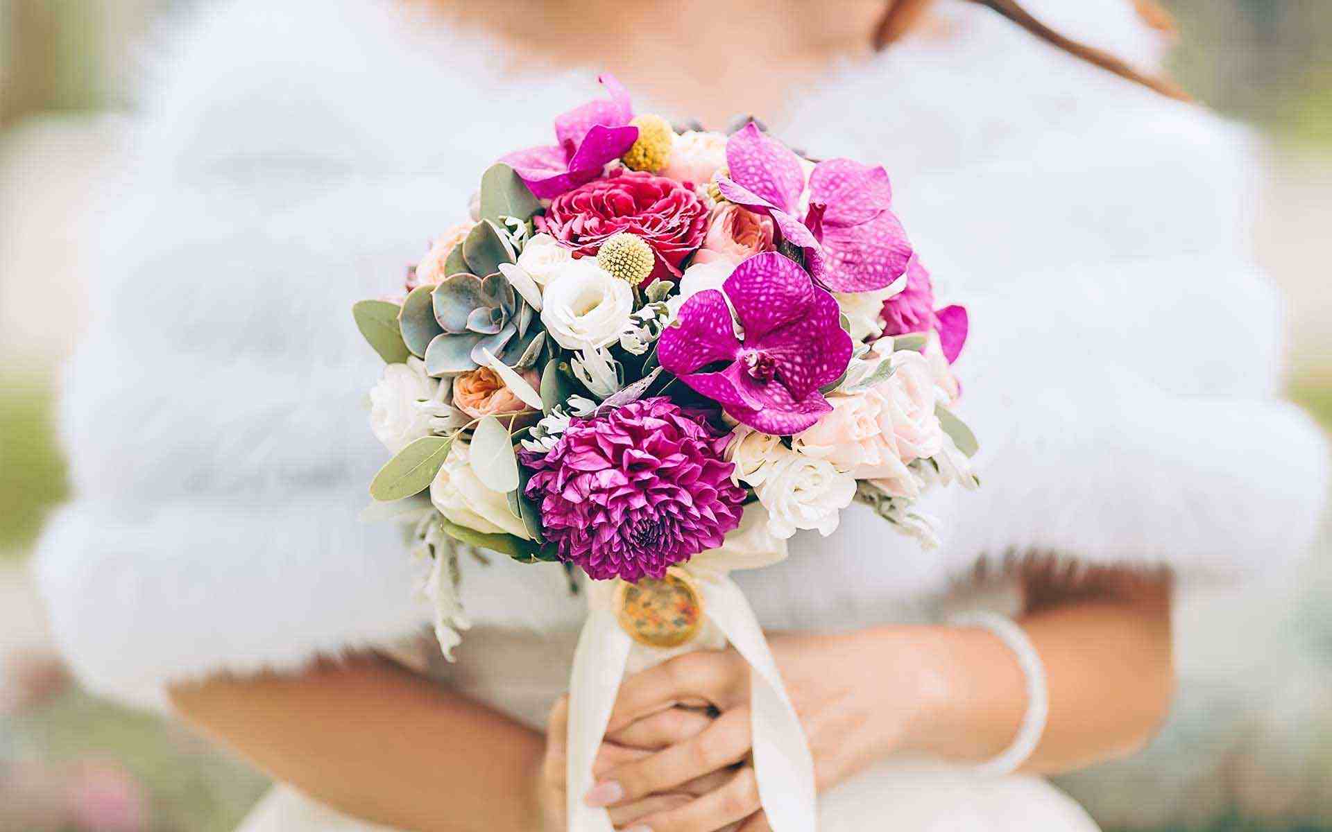 Winter-White-Wedding-Is-Brought-To-Life-Through-Brides-Fuchsia-Flowers