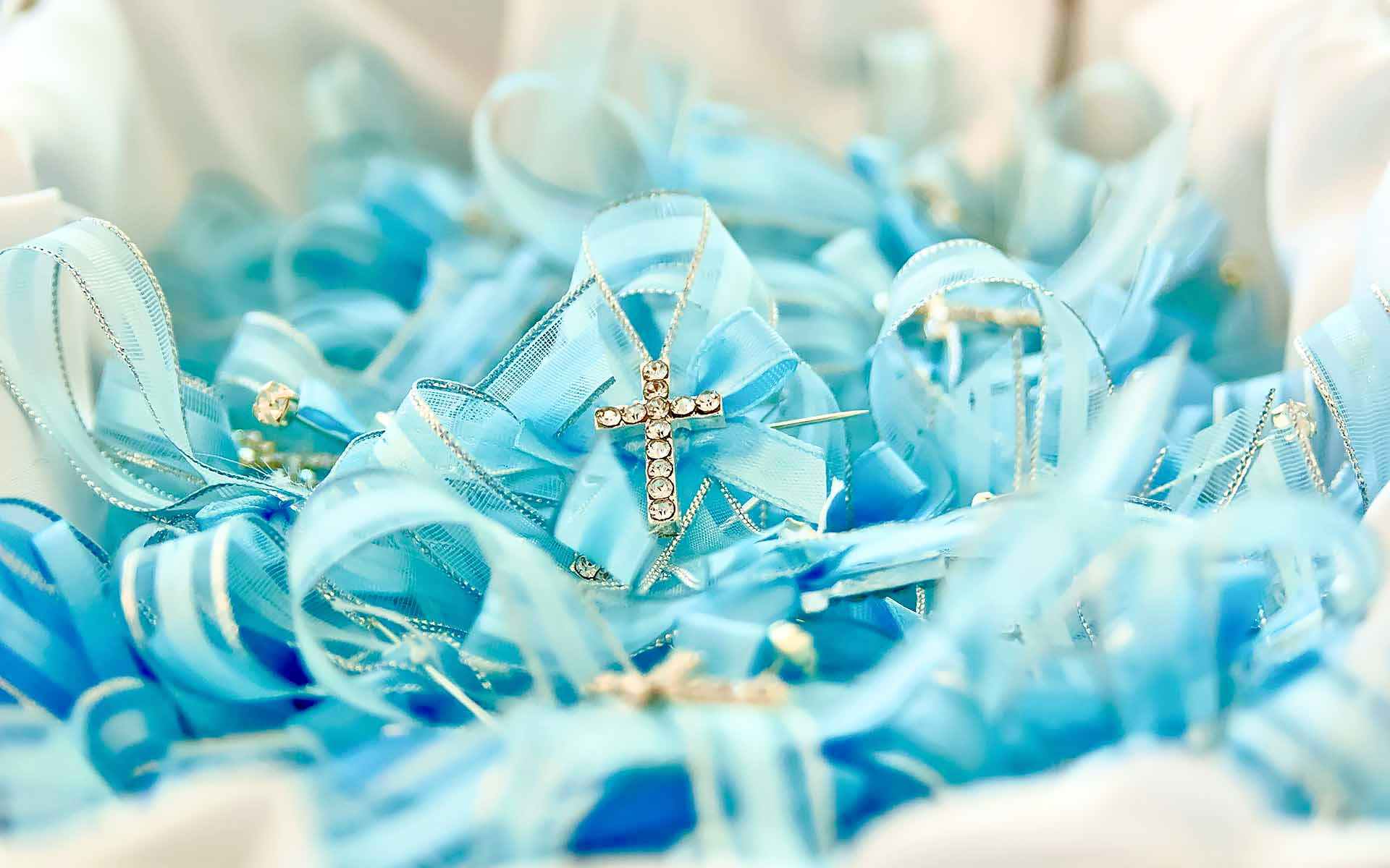 Witnessing-A-Baptism-Is-A-Blessing-Honorary-Guests-Are-Greeted-With-Beautiful-Crystal-Cross-And-Blue-Ribbon-Pins