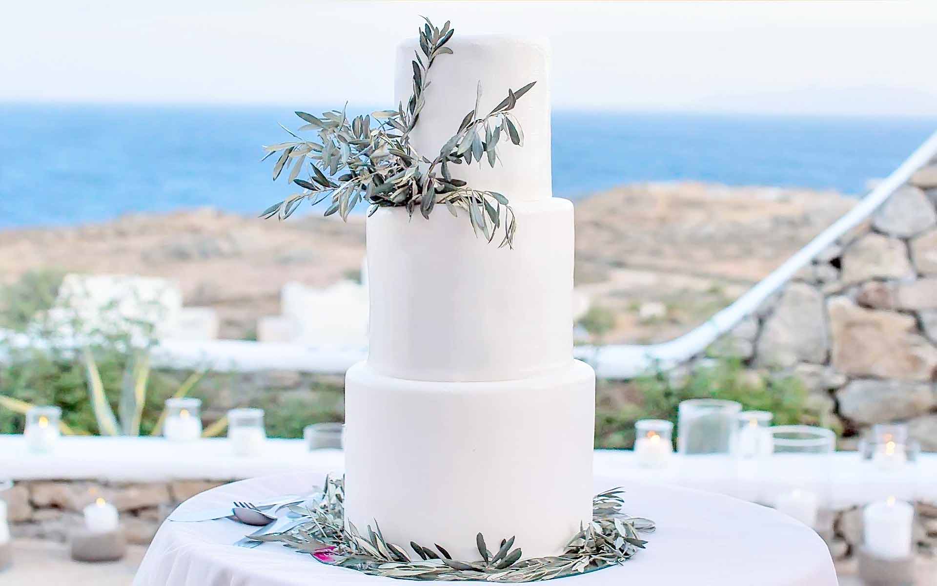 Sweet Connoisseur - Little Greek style wedding cake. Coconut lime and  coconut mango layers. A surprise cake😁 ordered by overseas relatives  unable to attend😥 | Facebook