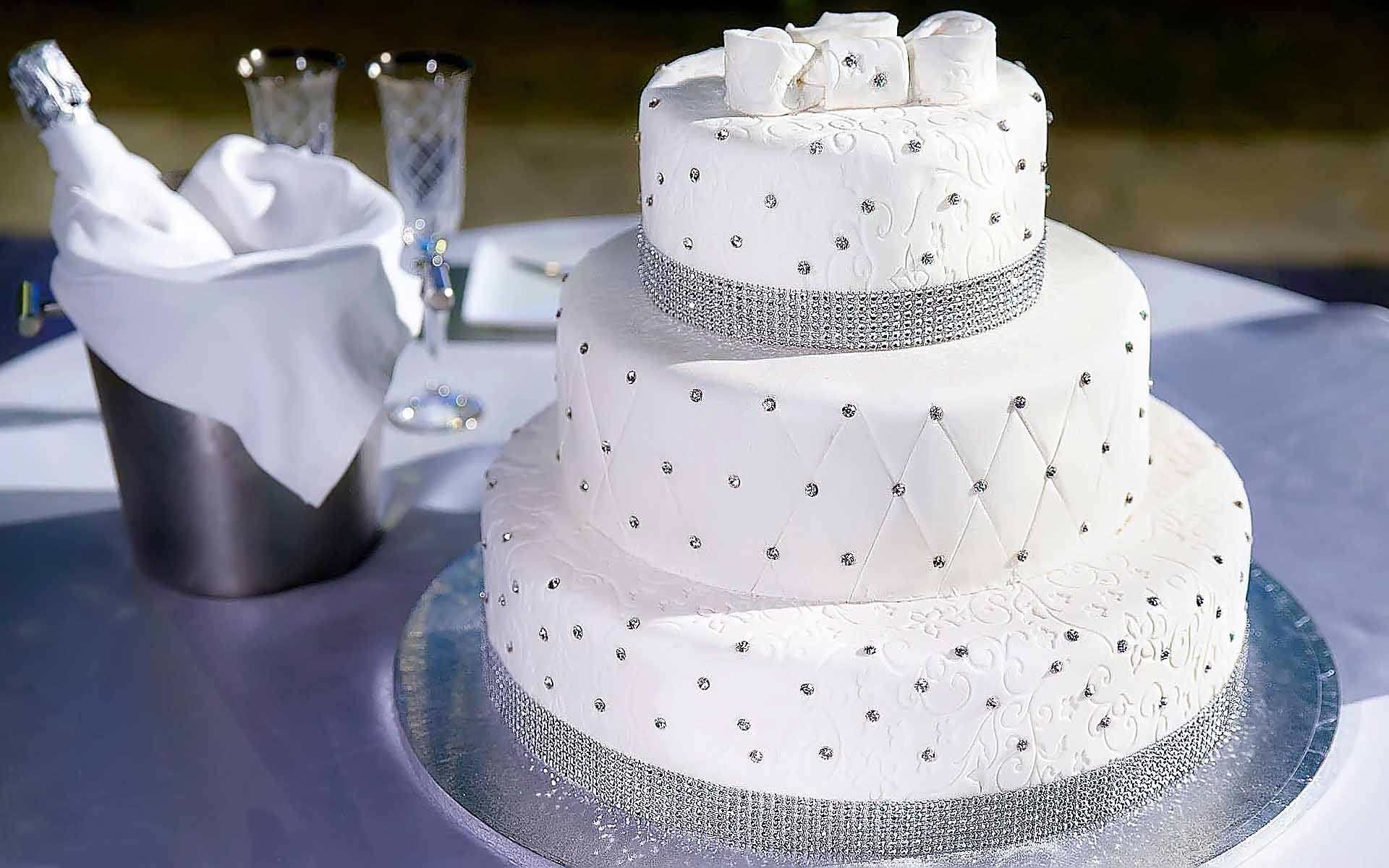 Quilt-Texture-And-Intricate-Crystal-Details-Make-For-An-Elegant-Wedding-Cake