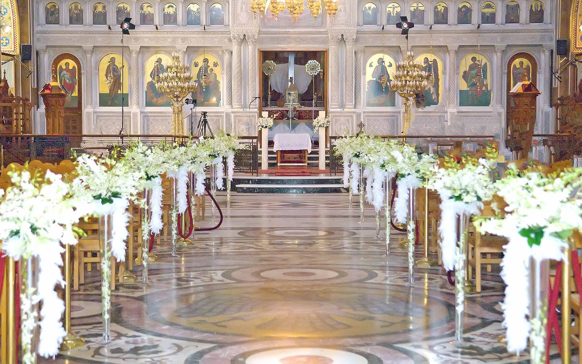 Gorgeous-Phalaenopsis-Orchid-Church-arrangements-with-Ostrich-feather