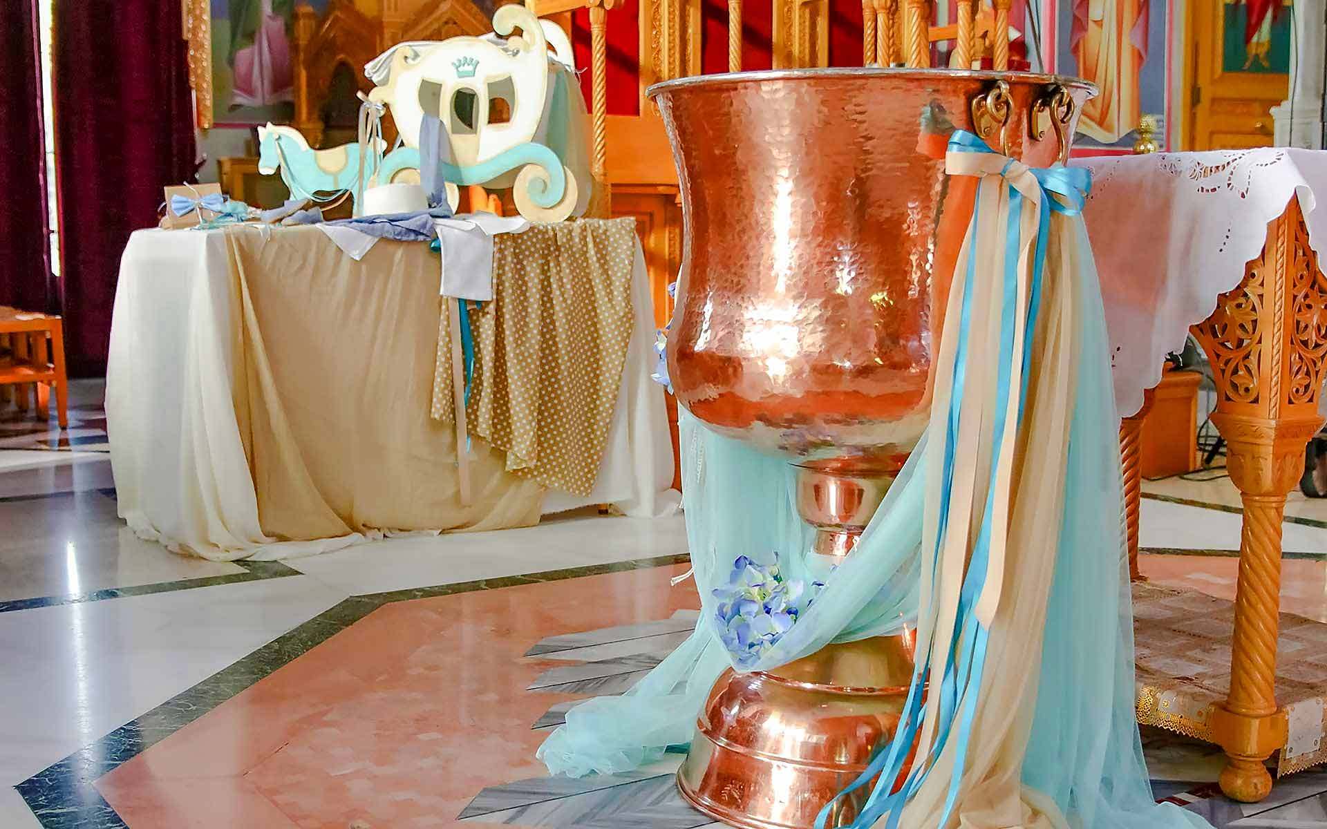 Turquoise-Fabrics-And-Ribbons-And-Blue-Hydrangeas-Are-Uniquely-Combined-To-Decorate-A-Rose-Gold-Baptistery