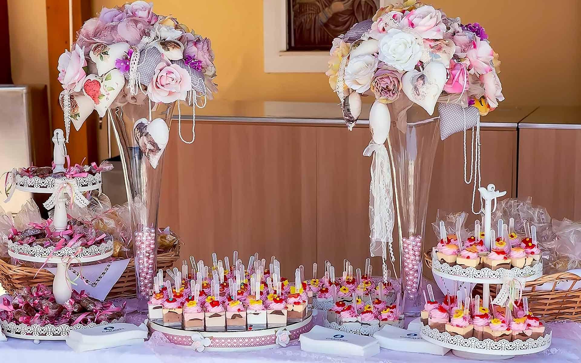 Tailor-Made-Baptism-Dessert-Table-With-Pastel-Fabrics-In-Big-Vases