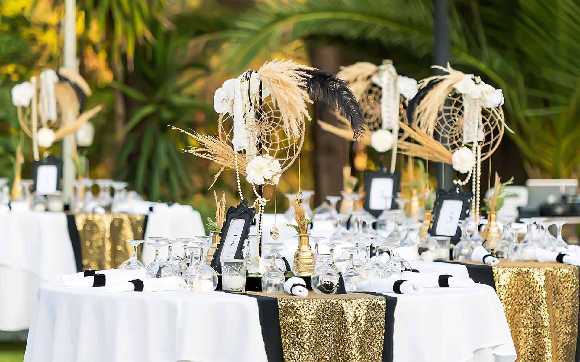 Black and gold wedding centerpieces ideas with pampas grass by Rogdaki Events Trademark