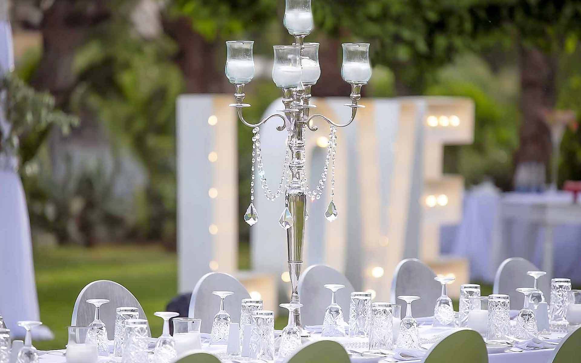 Crystal and Silver Candelabras a wedding  Centerpiece by Rogdaki Events Trademark