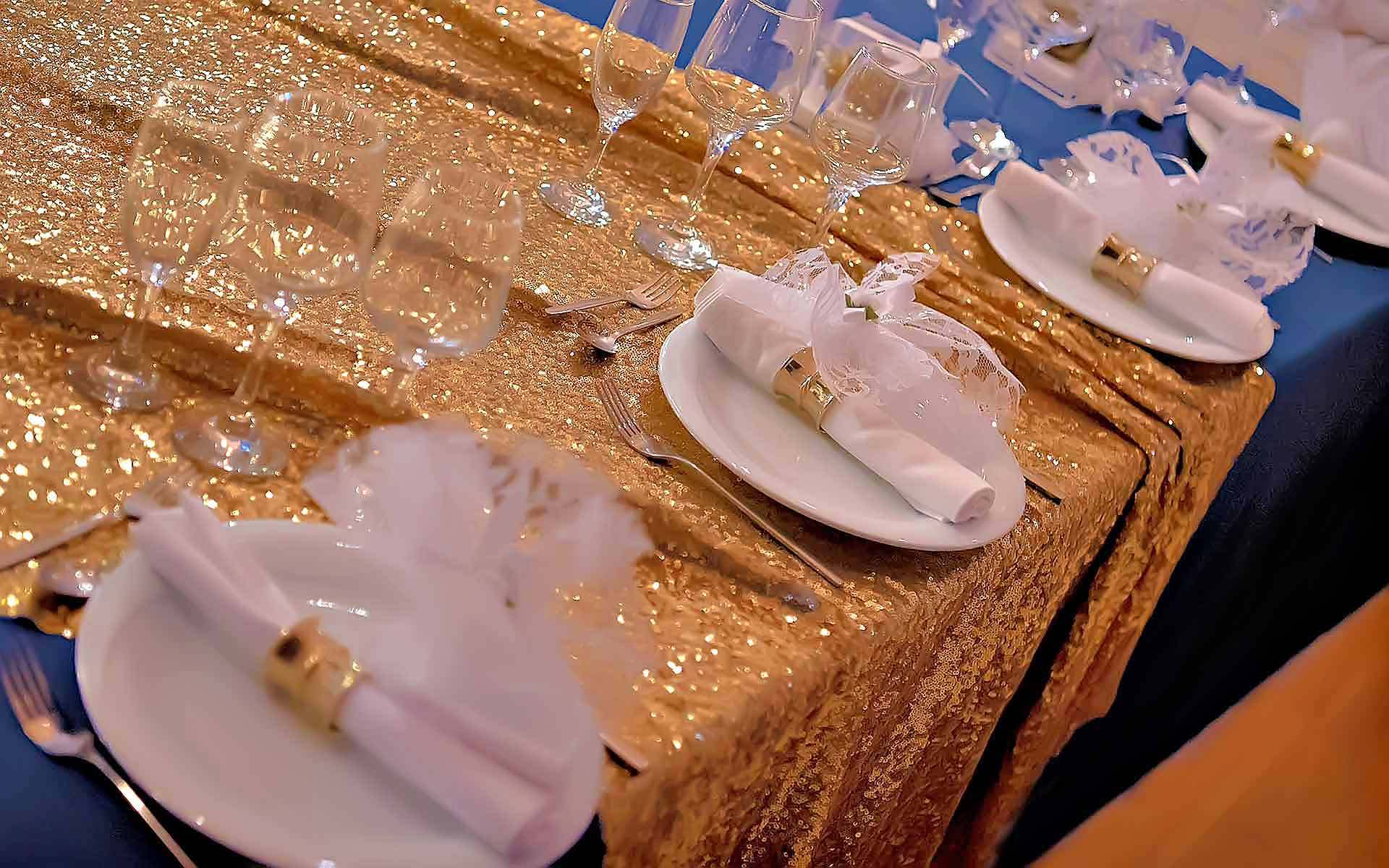 Elegant gold sweetheart table for a glam wedding by Rogdaki Events Trademark