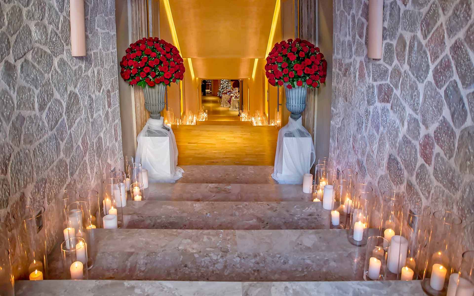 Entrance-Of-Candles-And-Red-Roses-For-A-Royal-Wedding