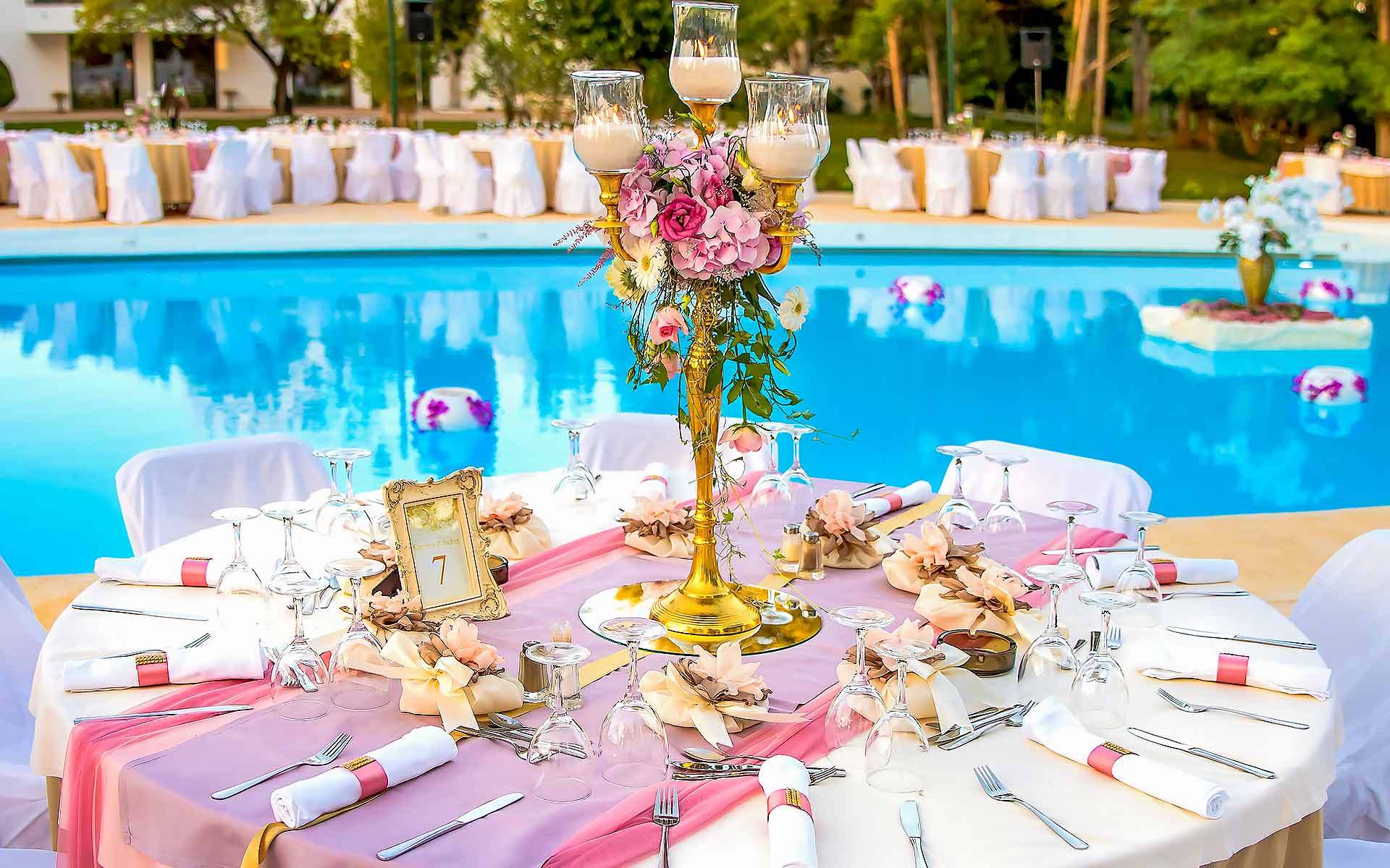 Gold-candlestick-centerpiece-in-pastel-colors-by-Diamond-Events