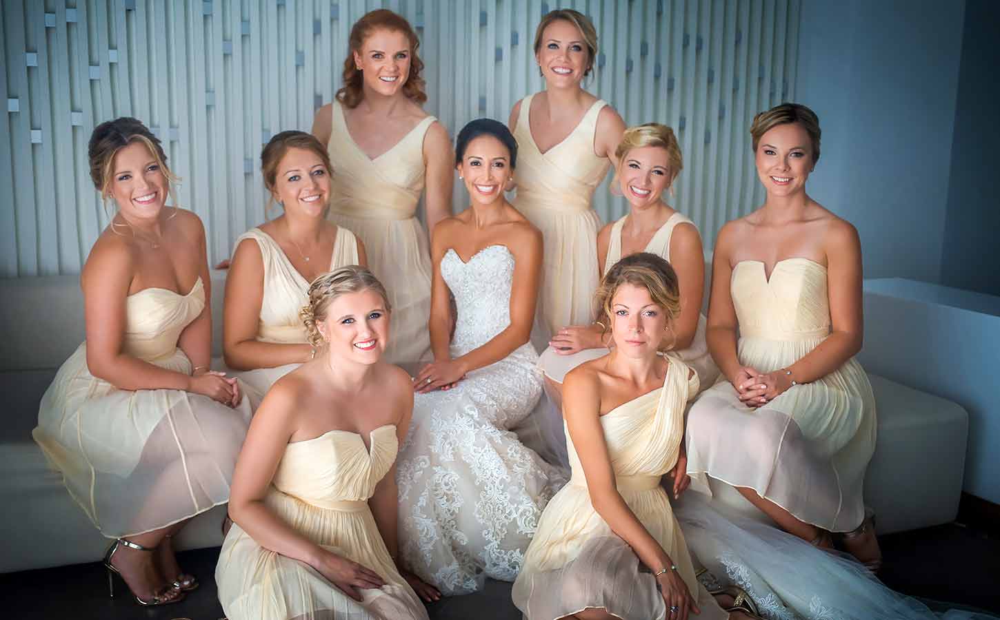 a beutiful bride with her friends posing