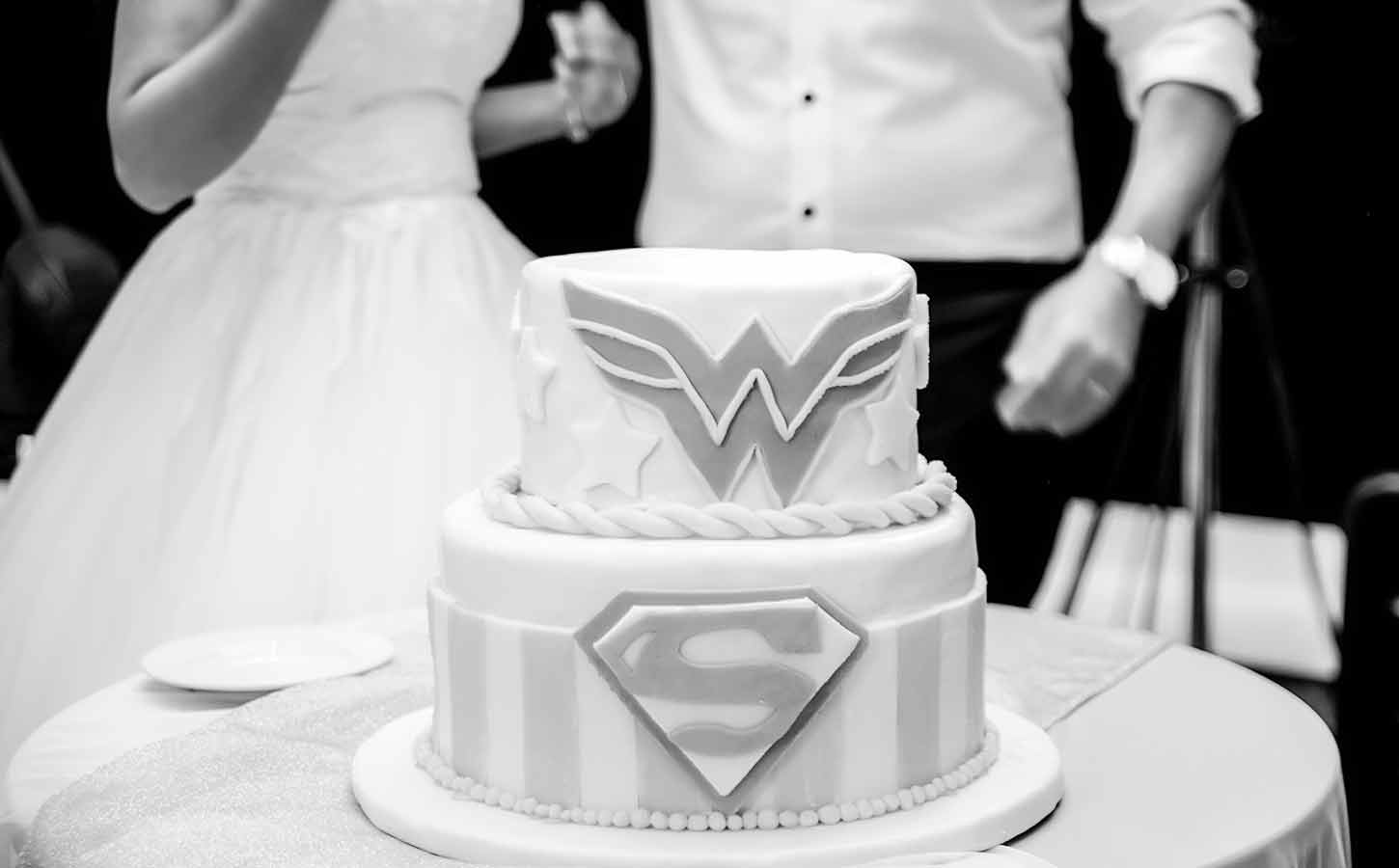 wonder woman and superman wedding cake for a lebanese wedding in mykonos