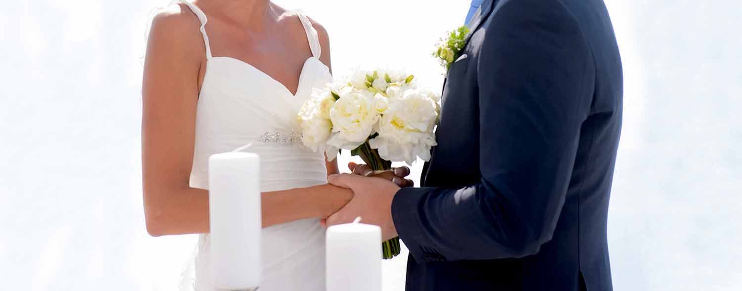 Diamond Events Santorini Wedding at Le Ciel wedding couple hands 1