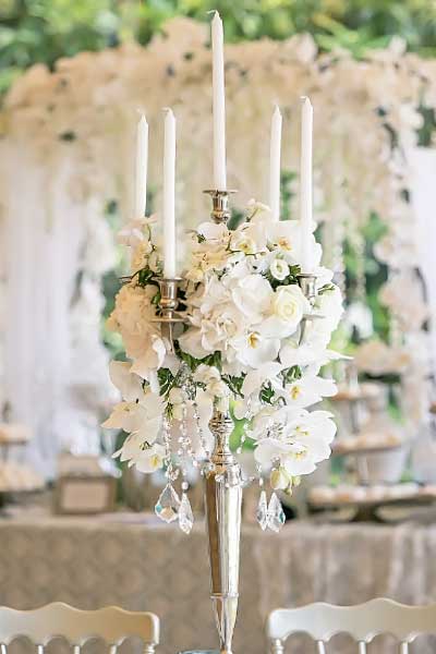 Candelabra wedding decoration with white orchids by diamond events planning services