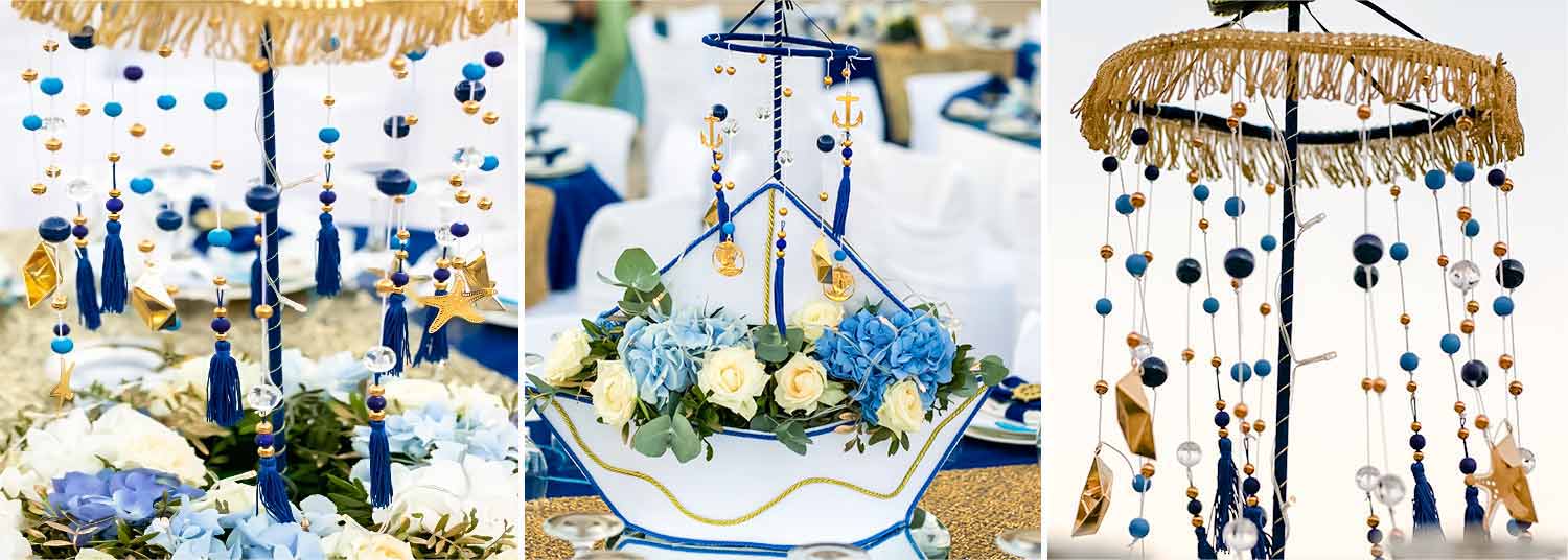 Blue and gold elements and natural flowers on the table centerpieces for a royal navy themed baptism by Diamond Events