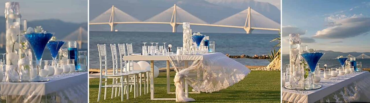 The sweetheart table at the wedding reception designated solely for the newlywed couple with the Rio Antirio bridges view