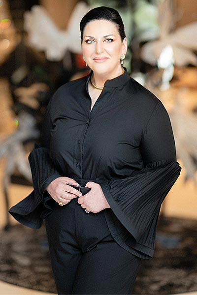 Anna Maria Rogdaki, founder of Rogdaki Events, known for her designs & the exceptional coordination.