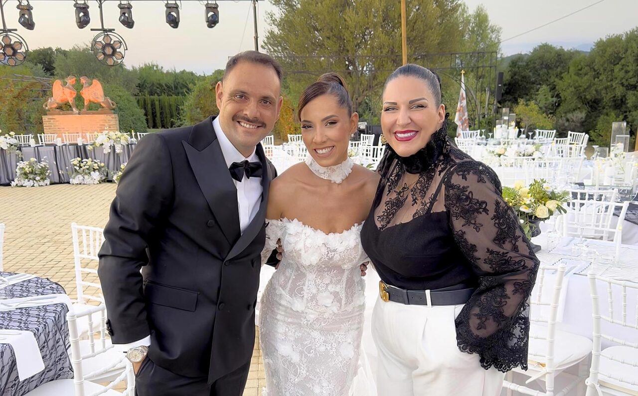 Anna Maria Rogdaki with Dimitra and Zois on their wedding day, moments before their elegant ceremony begins.