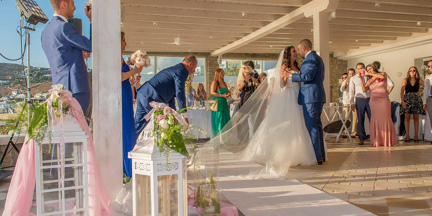 happy couple is dancing for their Lebanese Egyptian Wedding in Mykonos by Diamond Events event agency 1