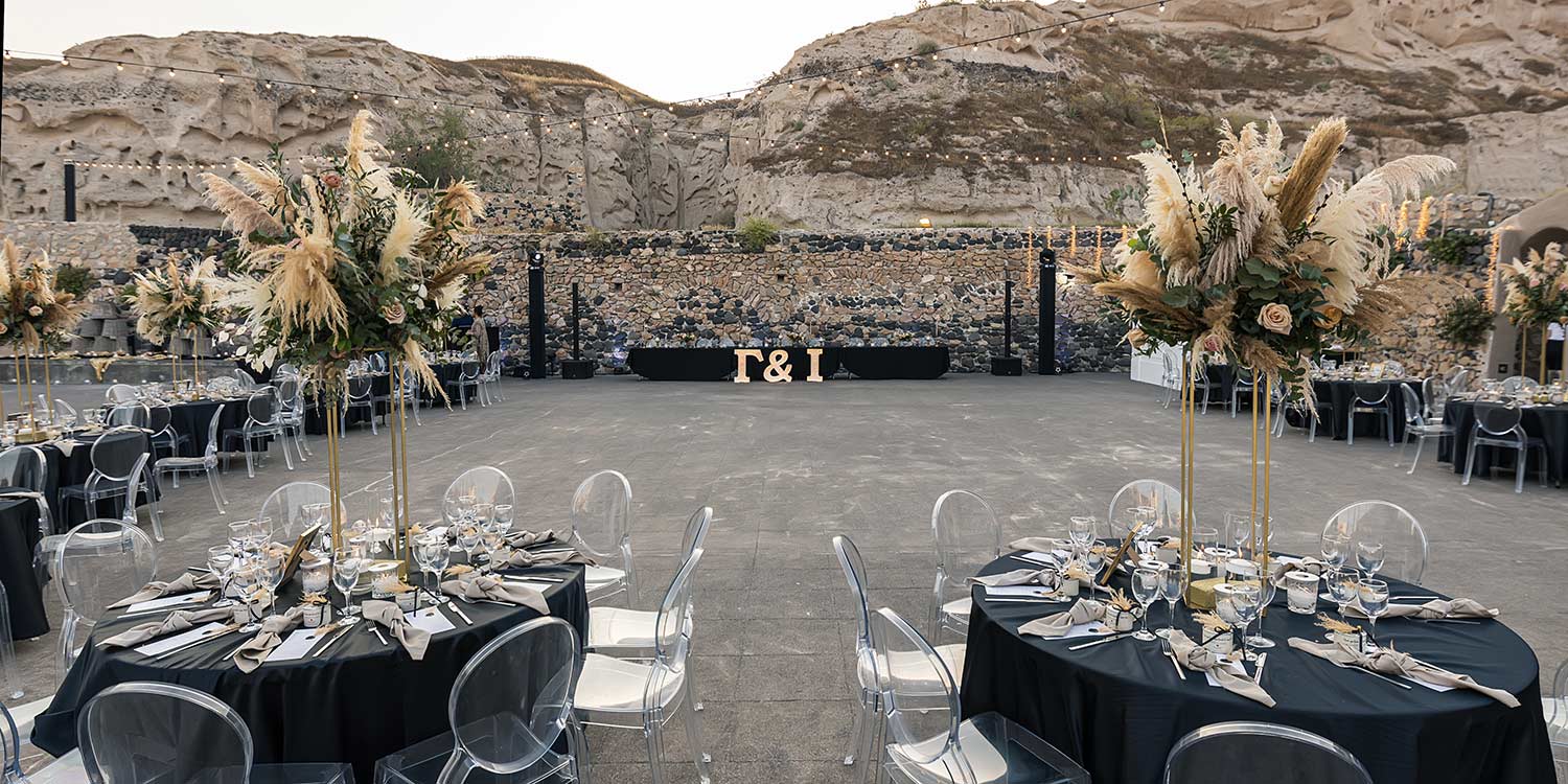Santorini Wedding BLACK AND CLEAR CHAIRS AND GOLD PAMPASS in Tomato Industrial Museum by Diamond Events