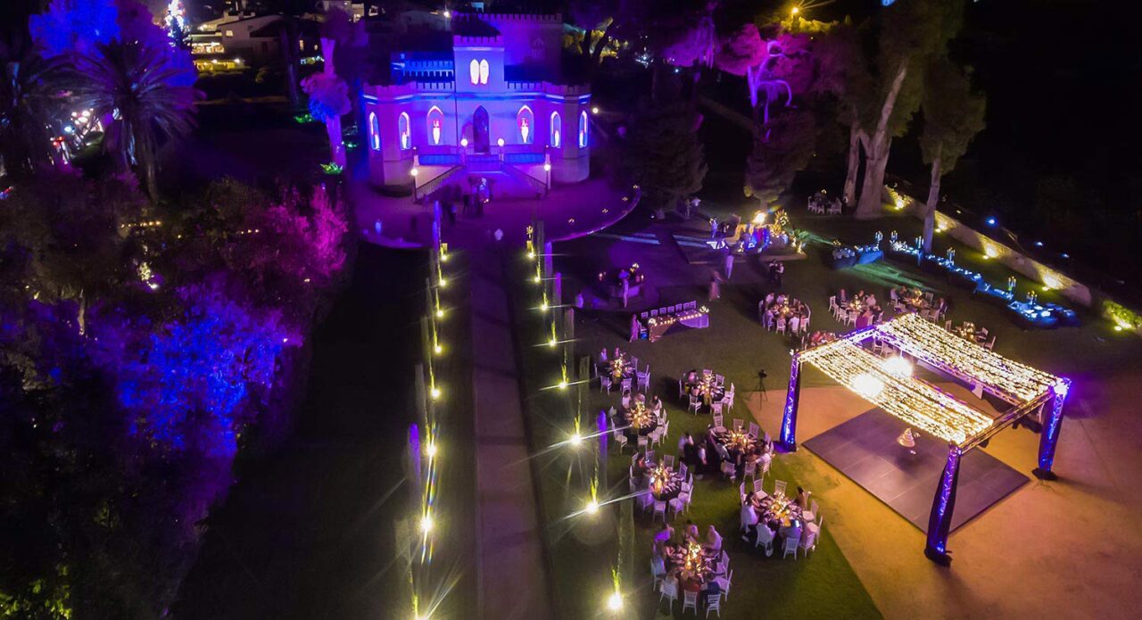 A panoramic view of a luxury private villa wedding reception dinner by Rogdaki Events
