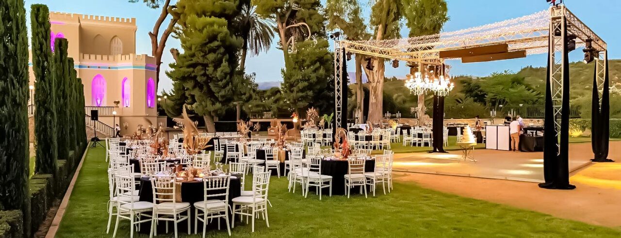 Wedding reception in a private villa with the fairylilights and the crystal chandeliers to create the most romantic feeling by Rogdaki Events