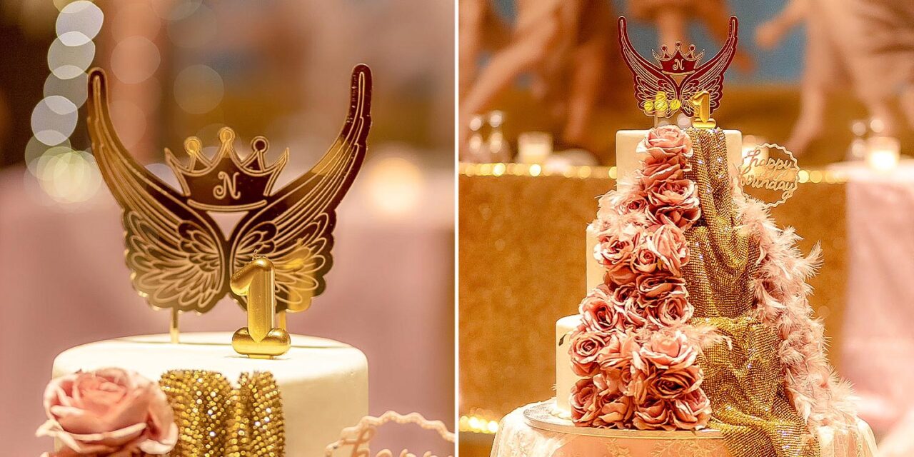 A Miracle Girl Baptism at Royal Theater — a cake crowned in roses and gold, celebrating one year of wonder and grace
