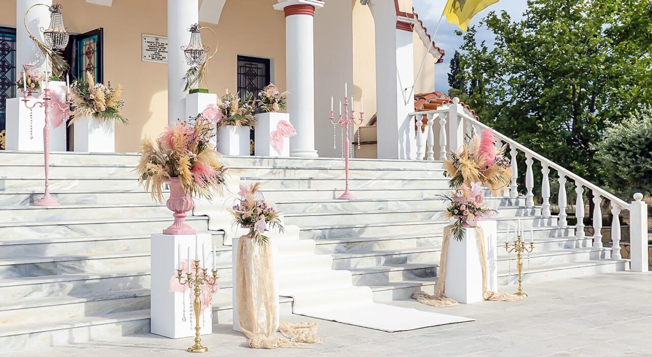 A Miracle Girl Baptism at Royal Theater — blush candles and angel wings guide us to a sacred celebration.