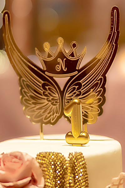 Golden wings, crown, and number one — a symbol of love, light, and a little miracle.