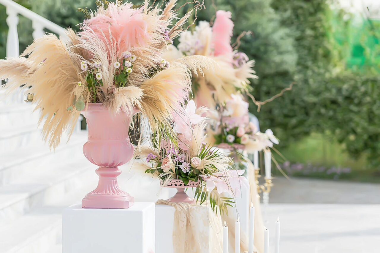 Pampas grass and roses in dreamy pink hues. A Miracle Girl Baptism at Royal Theater, Rogdaki Events