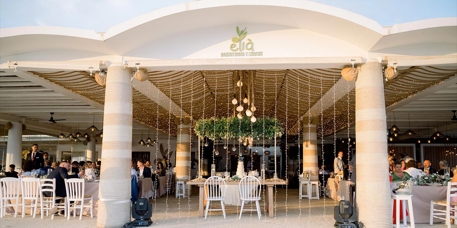 Πολυτελής Γάμος στη Μύκονο 21 Under twinkling lights hearts gathered. Mediterranean Romance in Mykonos by Rogdaki Events