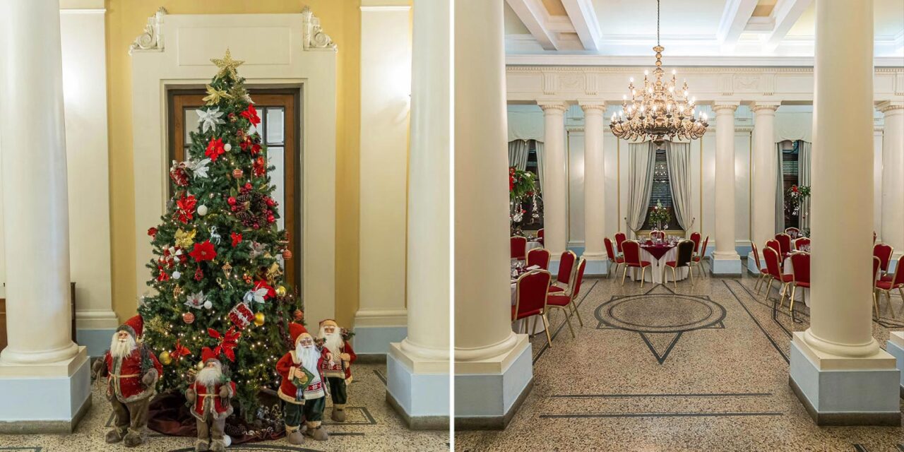 ogdaki Events transforms the elegant hall into a Christmas baptism venue with red accents and chandeliers