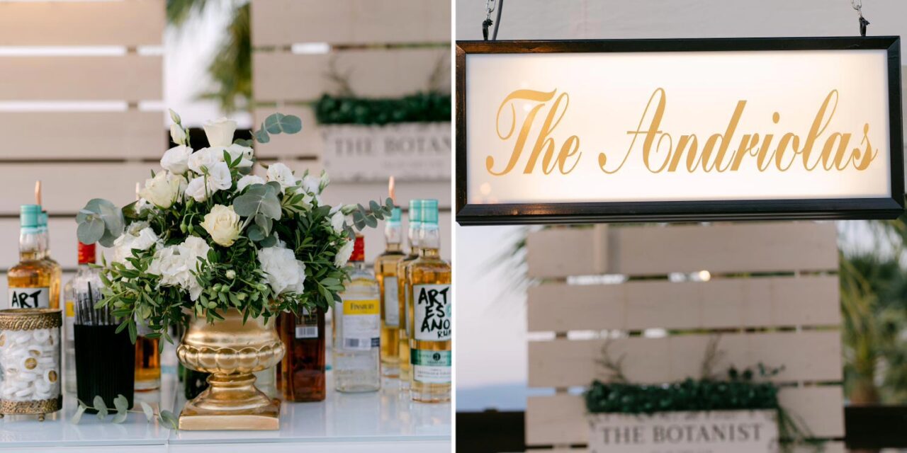 Rogdaki Events styled an elegant cocktail bar for a Luxury Seaside Wedding in Greece, complete with floral accents and signage