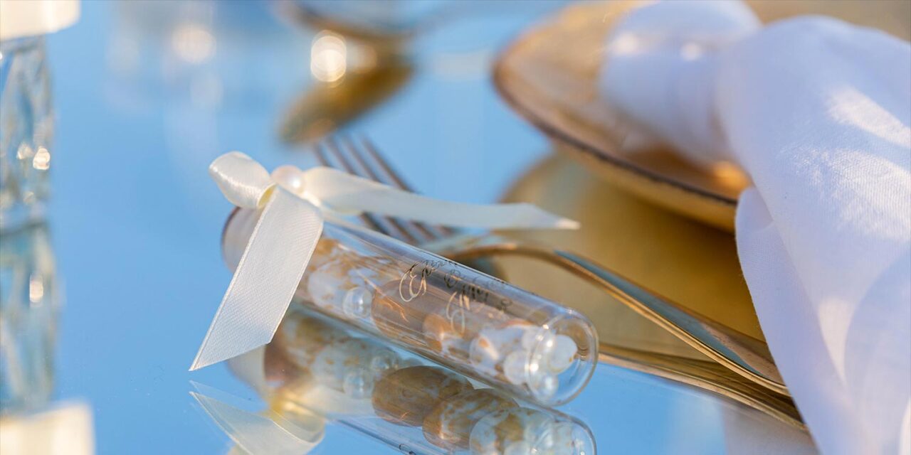 Rogdaki Events styled elegant guest favors for a Luxury Seaside Wedding in Greece, adorned with seashells and pearls