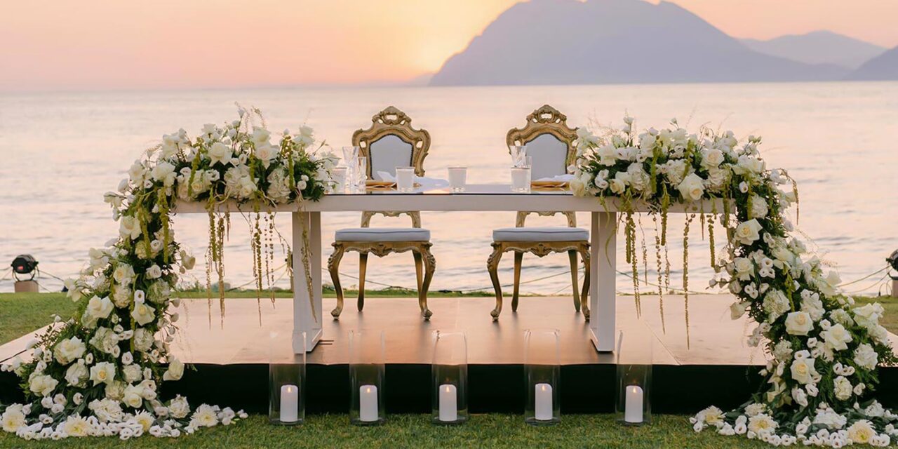 Seaside sweetheart table designed by Rogdaki Events, epitome of Luxury Seaside Wedding in Greece.