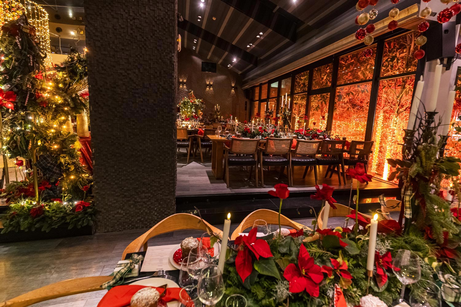 Mesmerizing Christmas Baptism Decoration 12 Christmas baptism dinner at Distinto by Rogdaki Events—garlands, poinsettias, and candlelit tables radiate festive elegance