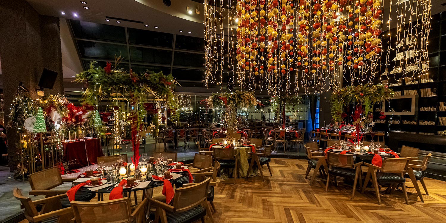 Mesmerizing Christmas Baptism Decoration 18 Christmas baptism dinner at Distinto by Rogdaki Events—twinkling ceiling lights and lush florals crown the celebration
