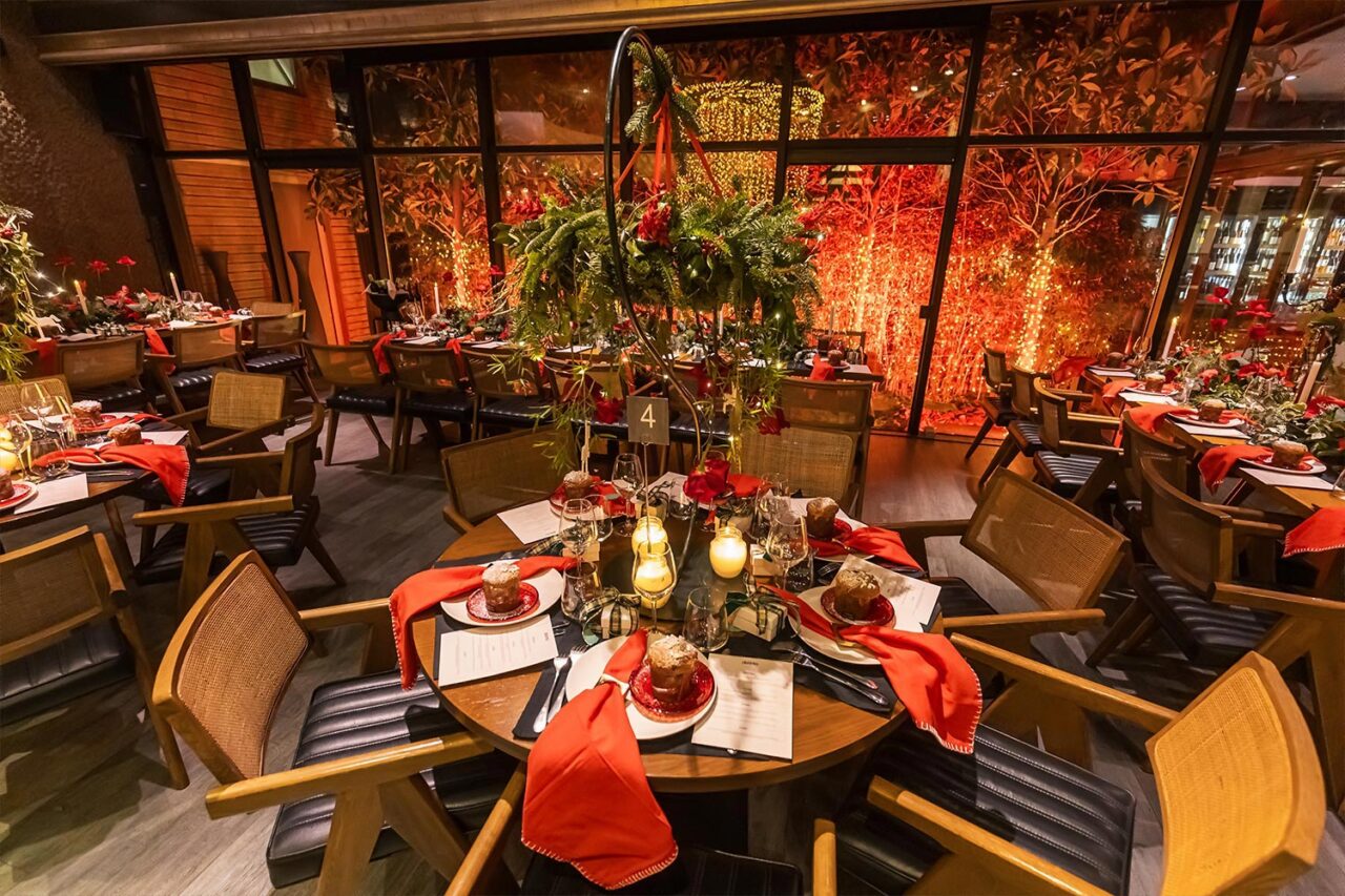 Mesmerizing Christmas Baptism Decoration 11 Christmas baptism dinner at Distinto by Rogdaki Events—warm lights, red accents, and festive elegance in every detail