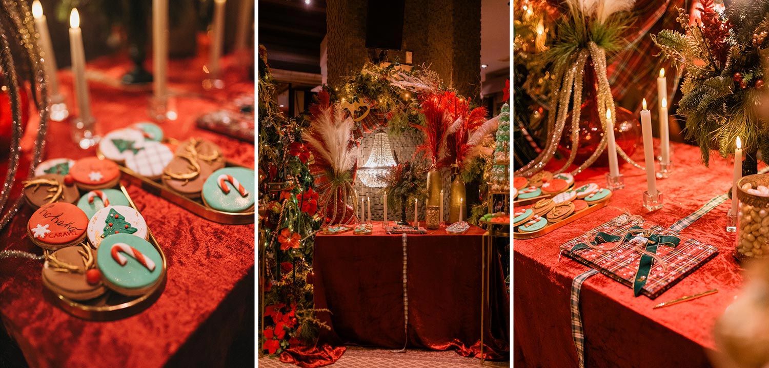 Mesmerizing Christmas Baptism Decoration 32 Trays of custom cookies featuring gold reindeer antlers, candy canes, and Christmas trees are set on red velvet tablecloths.