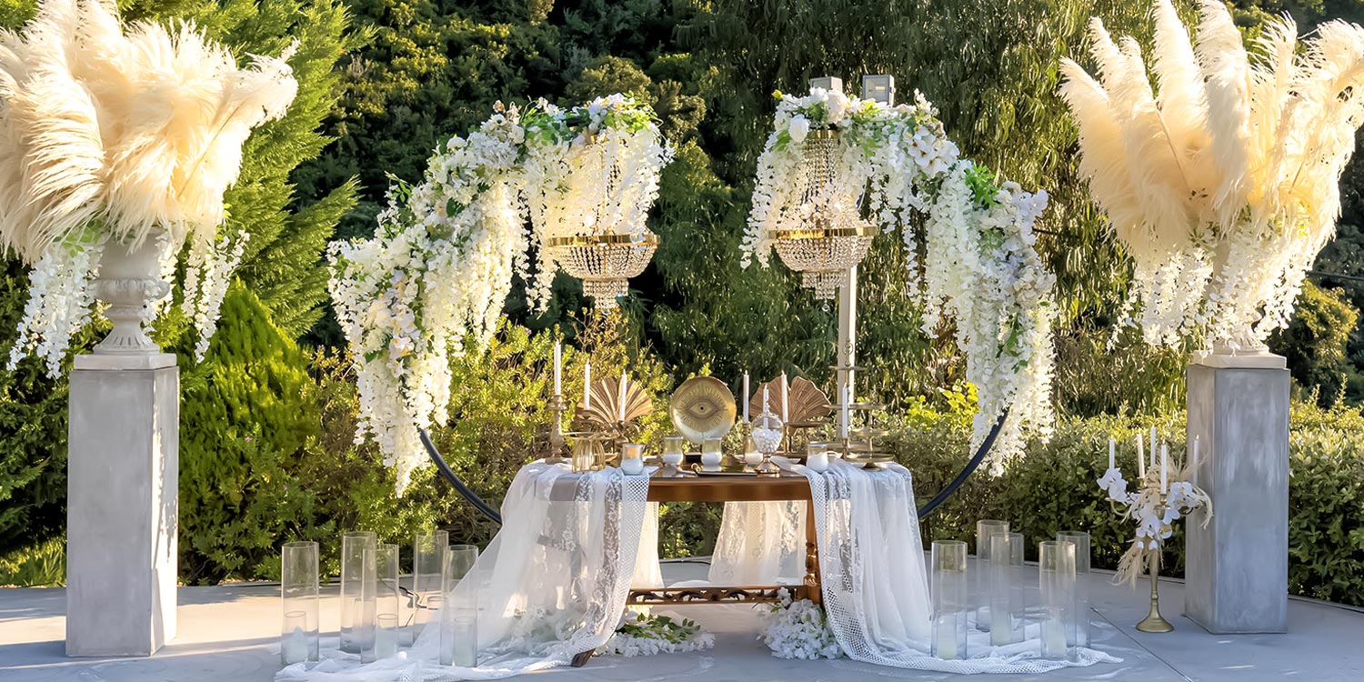 Greek‑French Chic Wedding 17 A beautifully decorated sweetheart table set by Rogdaki Events at the Idilofon venue.