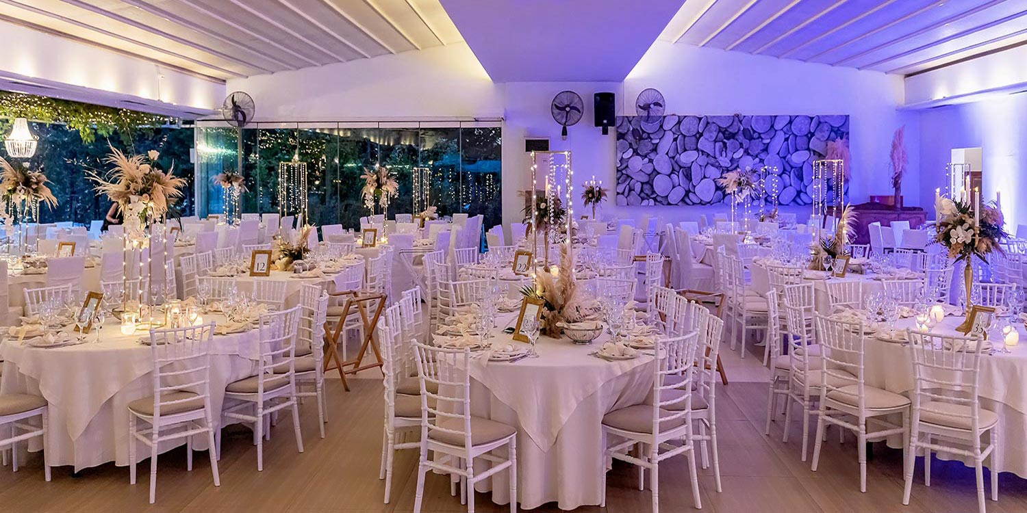 Trichonida Lake Wedding 27 Boho Chic Decor with Centerpieces featuring pampas grass, white orchids, and delicate greenery