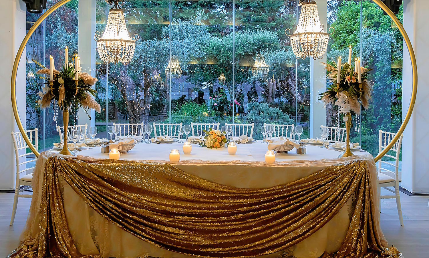 Trichonida Lake Wedding 20 Golden elegance by Rogdaki Events for a lake wedding at Pithari—crystal chandeliers, lush florals, candlelit grandeur