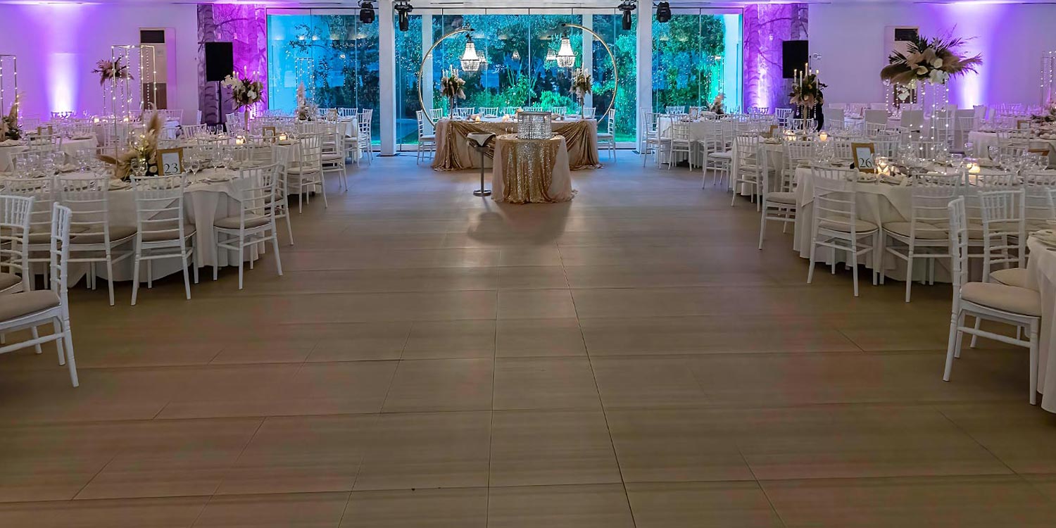 Trichonida Lake Wedding 21 Lake wedding at Pithari by Rogdaki Events—white florals, golden glow, and candlelit elegance in a dreamy hall