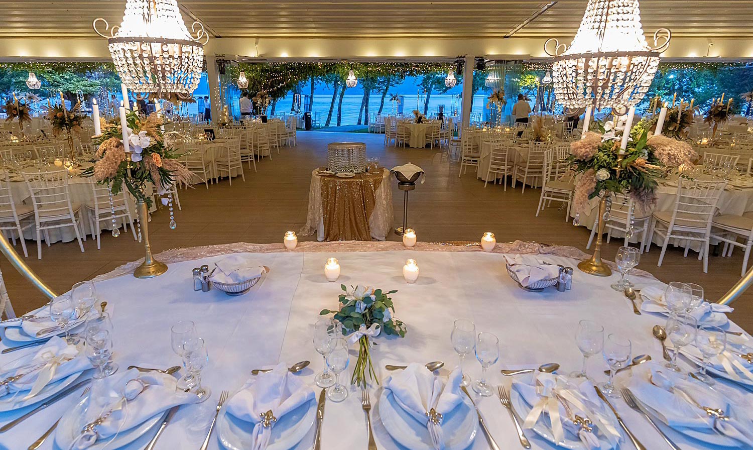Trichonida Lake Wedding 25 Lake wedding at Pythari by Rogdaki Events—ocean views, crystal chandeliers, and golden elegance in a candlelit celebration