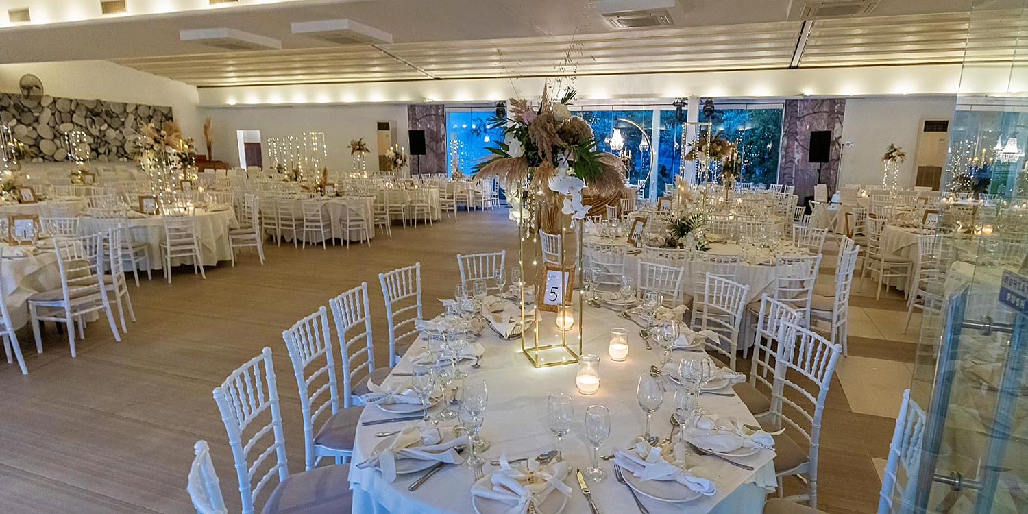 Trichonida Lake Wedding 26 Lake wedding at Pythari by Rogdaki Events—pampas florals, candlelit tables, and golden elegance in a romantic hall