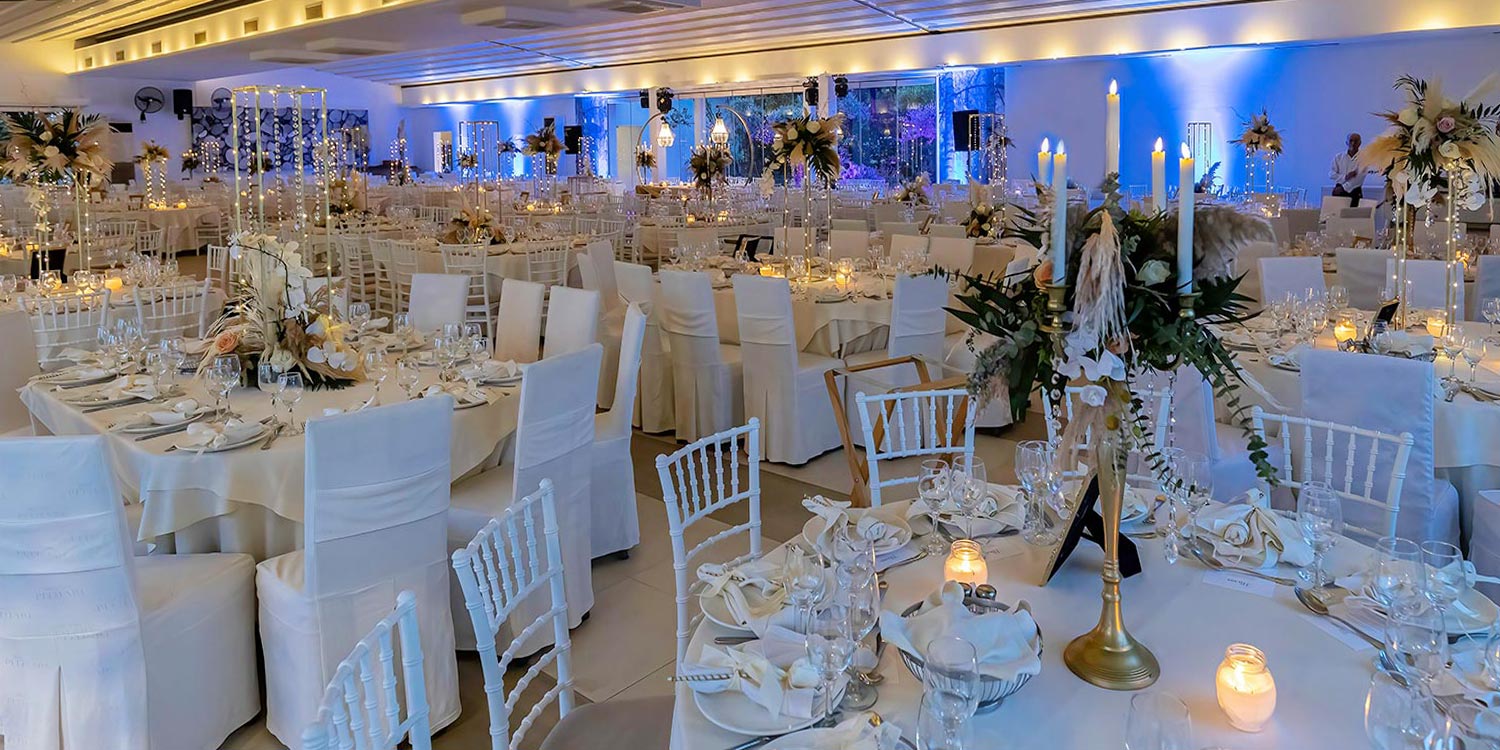 Trichonida Lake Wedding 22 Lake wedding at Pythari by Rogdaki Events—pampas florals, crystal chandeliers, and candlelit tables in a luxurious hall