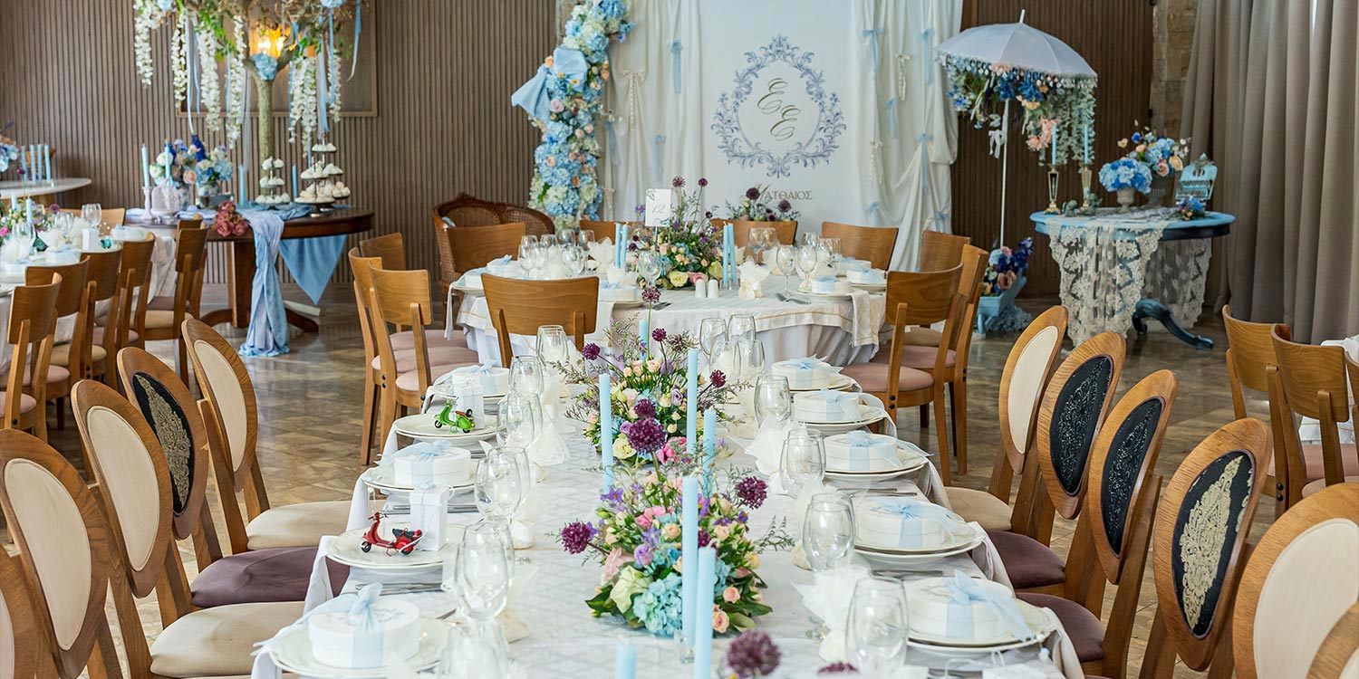 A Signature Wedding & Baptism Production in Blue 24 Luxury wedding at Korali, Agrinio, by Rogdaki Events featuring modern decor and pastel floral arrangements.