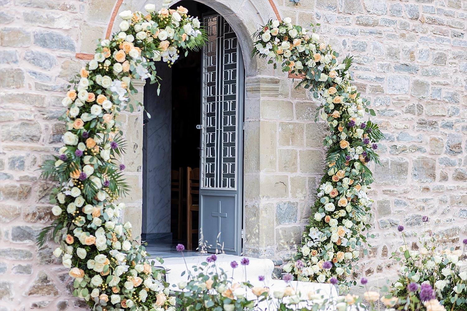 Trichonida Lake Wedding 5 Rogdaki Events adorned this sacred ceremony in agrinio with lush florals and Orthodox architectural grace