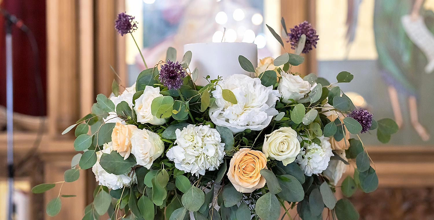Trichonida Lake Wedding 7 Rogdaki Events illuminated this indoor ceremony in agrinio with candlelight, peonies, and sculptural alliums