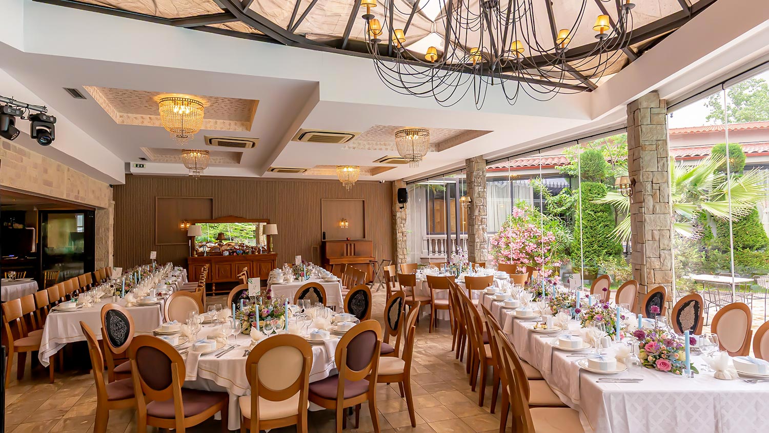A Signature Wedding & Baptism Production in Blue 27 Wedding at Korali, Agrinio by Rogdaki Events, featuring a bright, sophisticated reception setup and pastel details.